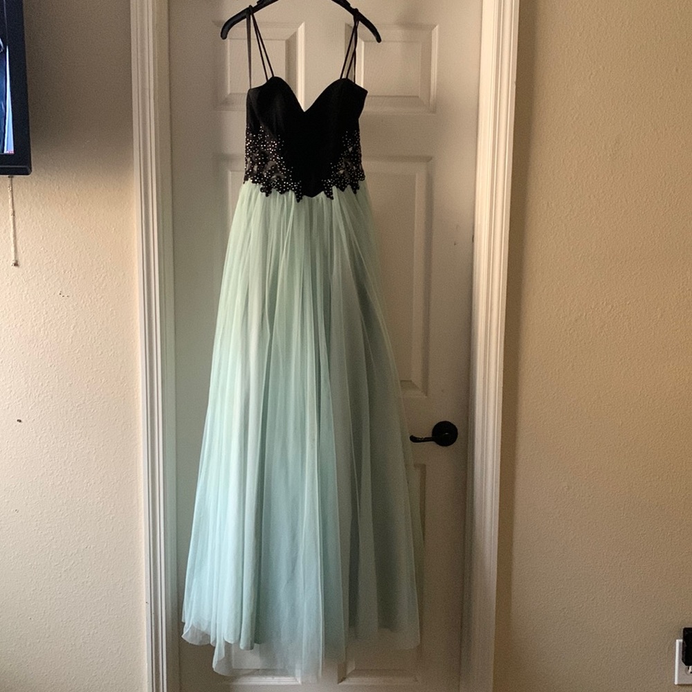 Size 3 blue black long dress with mesh cut outs on the side!